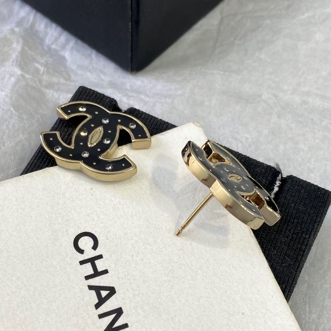 Chanel Black Star Earrings