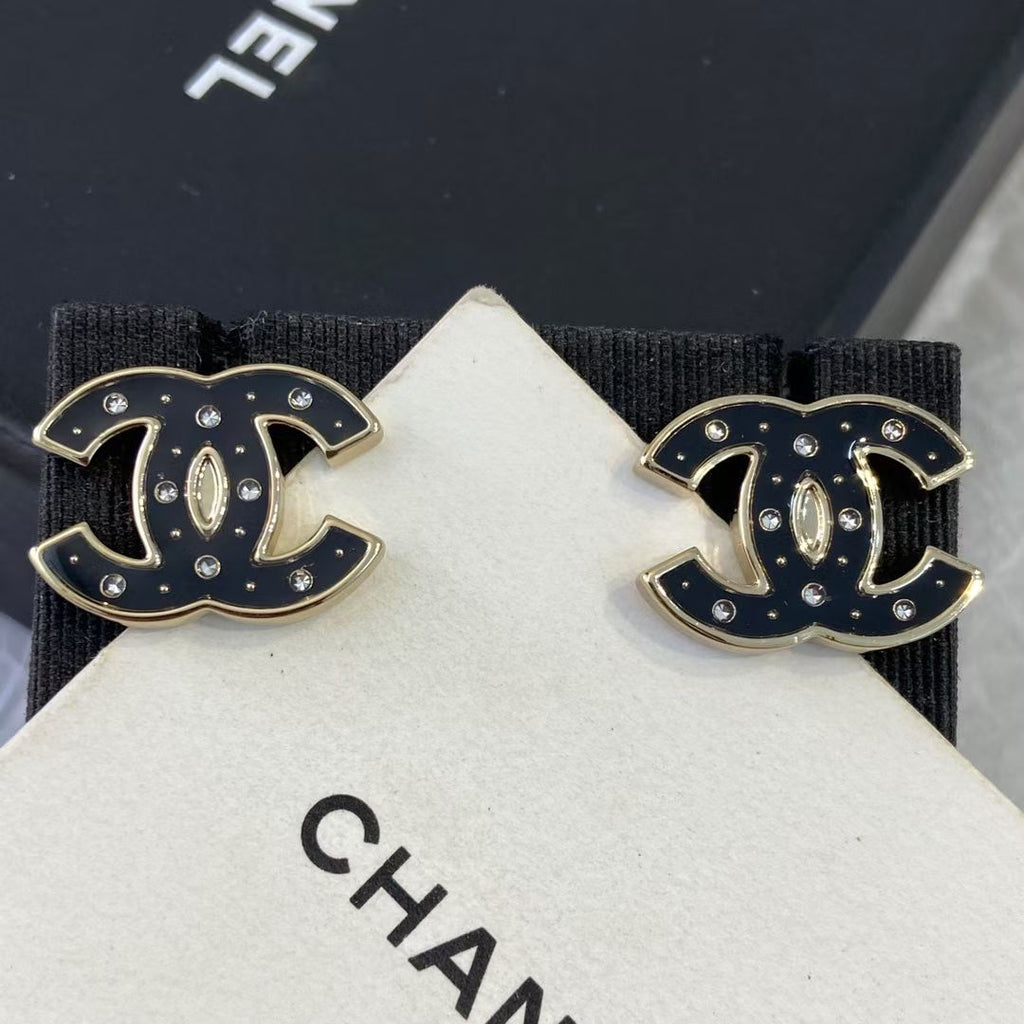 Chanel Black Star Earrings